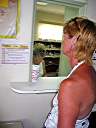 Nancy getting Walker's prescription at the Anegada Clinic