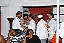 Chief Minister Dr. Orlando Smith and Nadine Battle, Executive Director of the BVICCHA, presenting Culinary Team hats to the team