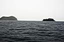 Tip of Ginger Island on the left, Carval Rock on the right.