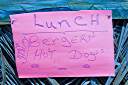 Sign at Eugene's beach bar at Smuggler's Cove.