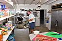 Carlos in the Cow Wreck kitchen. Carlos, his wife Tita, and their two daughters are from Puerto Rico and are frequent visitors at Cow Wreck. Carlos brought over a beautiful angus tenderloin (visible on prep table) that he cooked and shared with the Cow Wreck gang (us included). Thanks again, Carlos - and see you soon, amigo.