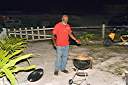 Wendell starting the fire for the tenderloin. Wendell uses a special charcoal lighter fluid that does not produce thatoily smell.
