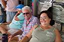 Vernon and Sheila watching the Dark and Stormy lay day dinghy races at Neptune's Treasure.