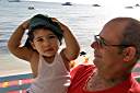 Thomas and Dean Soares watching the Dark and Stormy lay day dinghy races at Neptune's Treasure.
