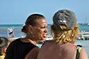 Winnie and Nancy watching the Dark and Stormy lay day dinghy races at Neptune's Treasure.
