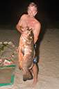 Holy snapper! Walker caught this fifty pound dogtooth snapper while sitting in Hidden Treasure's front yard!