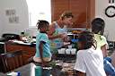 Preparing to dye Easter eggs with Trayesha, Janesha, and Lakesha.