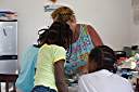 Preparing to dye Easter eggs with Trayesha, Janesha, and Lakesha.