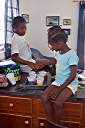 Dyeing Easter eggs with Trayesha, Janesha, and Lakesha.