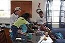 Dyeing Easter eggs with Trayesha, Janesha, and Lakesha.