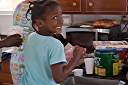 Dyeing Easter eggs with Trayesha, Janesha, and Lakesha.
