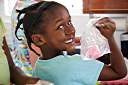 Dyeing Easter eggs with Trayesha, Janesha, and Lakesha.