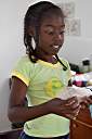 Dyeing Easter eggs with Trayesha, Janesha, and Lakesha.