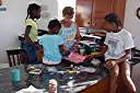 Dyeing Easter eggs with Trayesha, Janesha, and Lakesha.