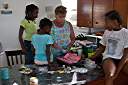 Dyeing Easter eggs with Trayesha, Janesha, and Lakesha.