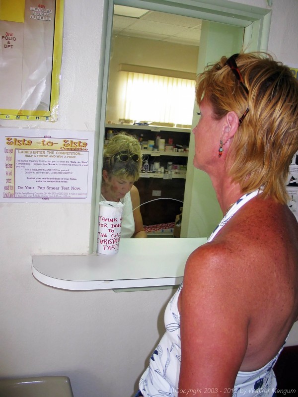 Nancy getting Walker's prescription at the Anegada Clinic