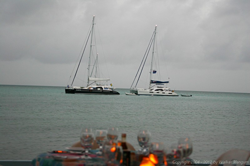 Two of the Moorings new 6200 catamarans at anchor off Neptune's Treasure.
