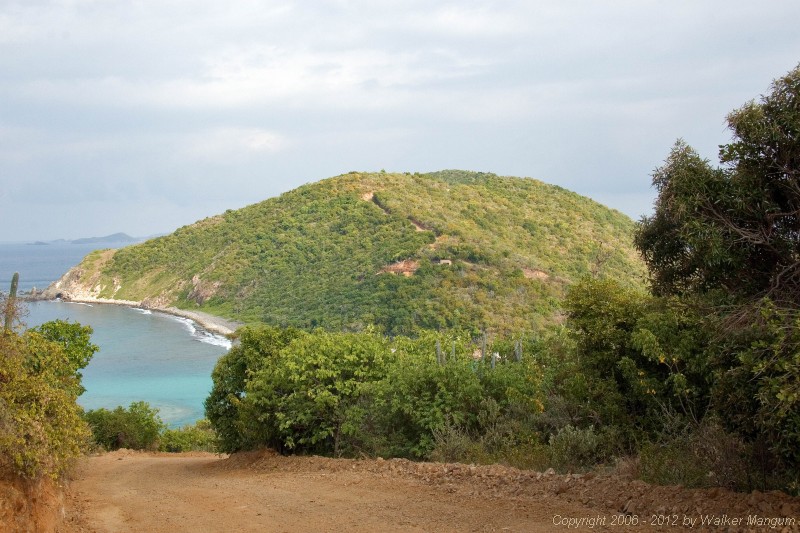 Driving over Scrub Island to Wali Nikiti construction site - visible in the center of the far hill.