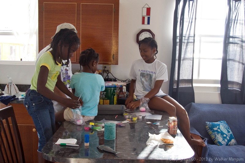 Dyeing Easter eggs with Trayesha, Janesha, and Lakesha.