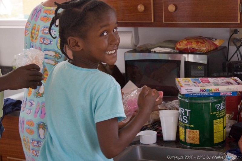Dyeing Easter eggs with Trayesha, Janesha, and Lakesha.