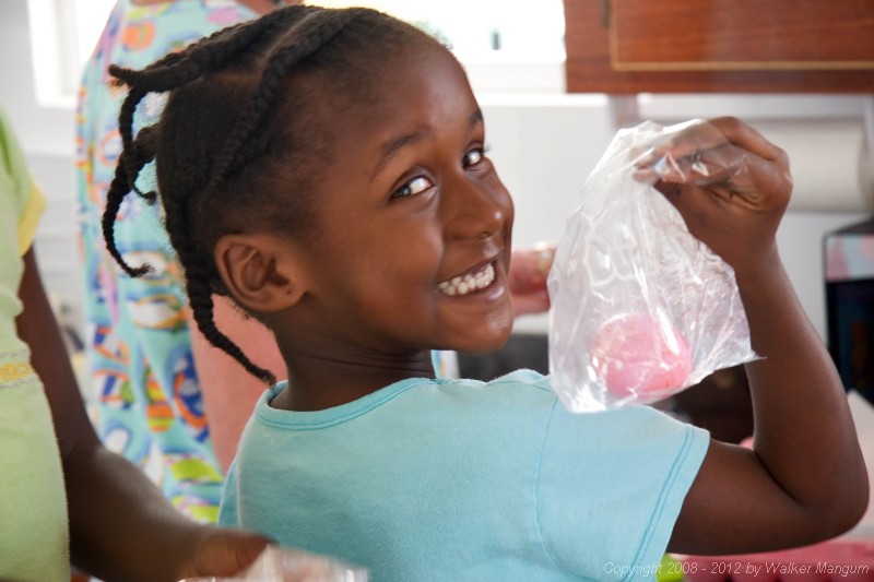 Dyeing Easter eggs with Trayesha, Janesha, and Lakesha.